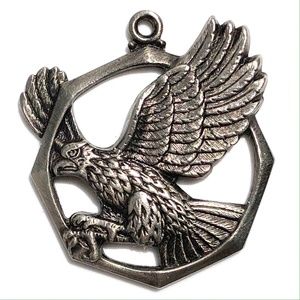 flying eagle pendant silver tone charm octagonal openwork wings talons prey bird